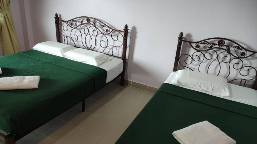 Kanza Beach Inn Marang Bagian luar foto