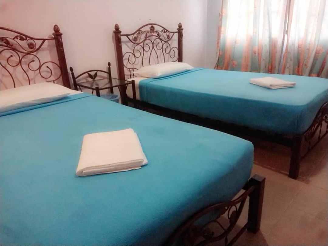 Kanza Beach Inn Marang Bagian luar foto