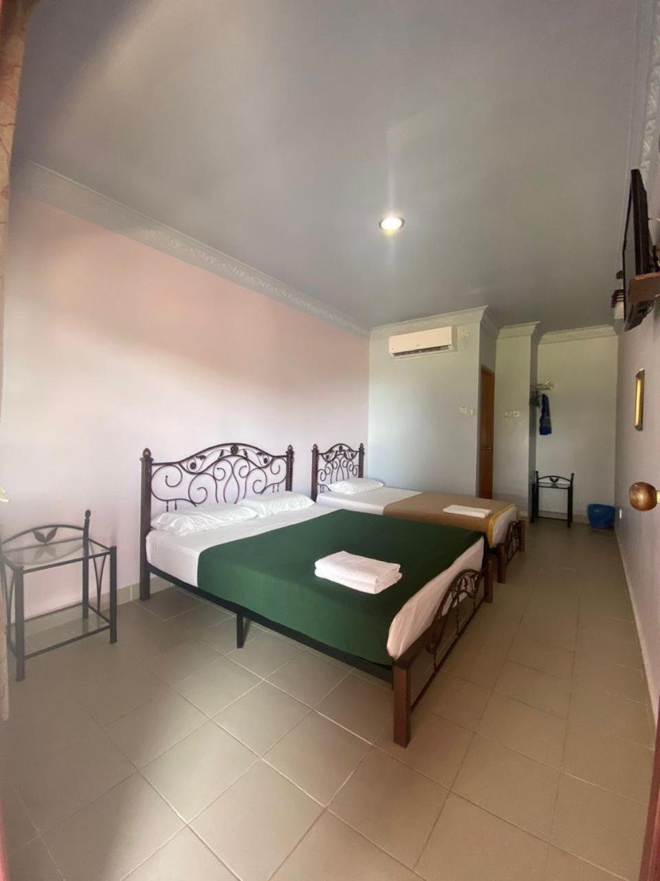 Kanza Beach Inn Marang Bagian luar foto
