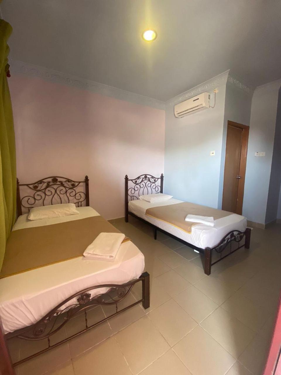 Kanza Beach Inn Marang Bagian luar foto